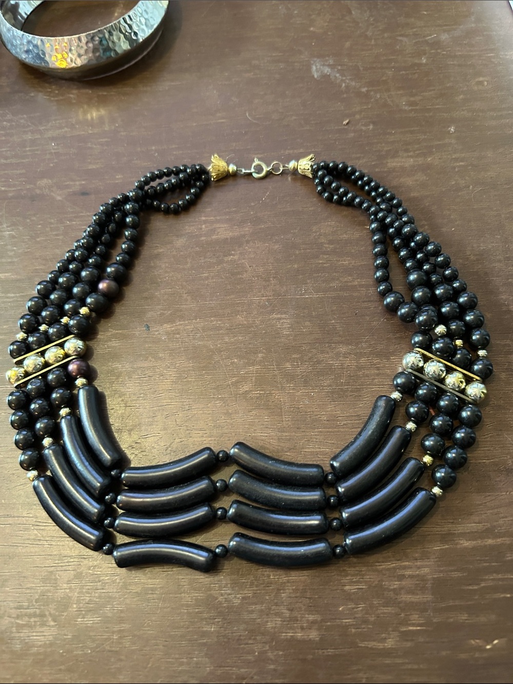 Black Multi-Strand Beaded Necklace with Gold Accents